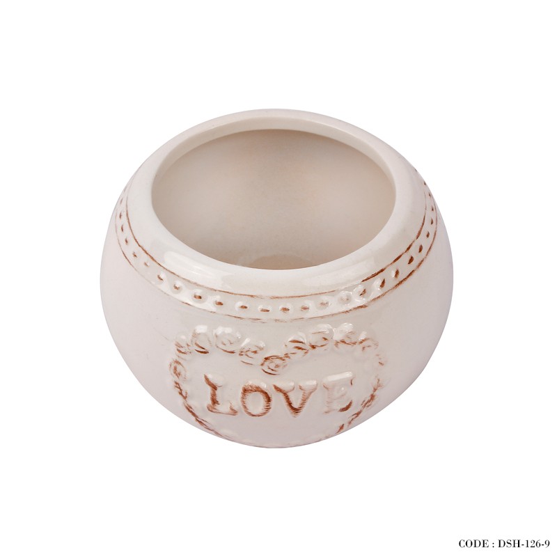 گلدان سرامیکی طرح home گرد