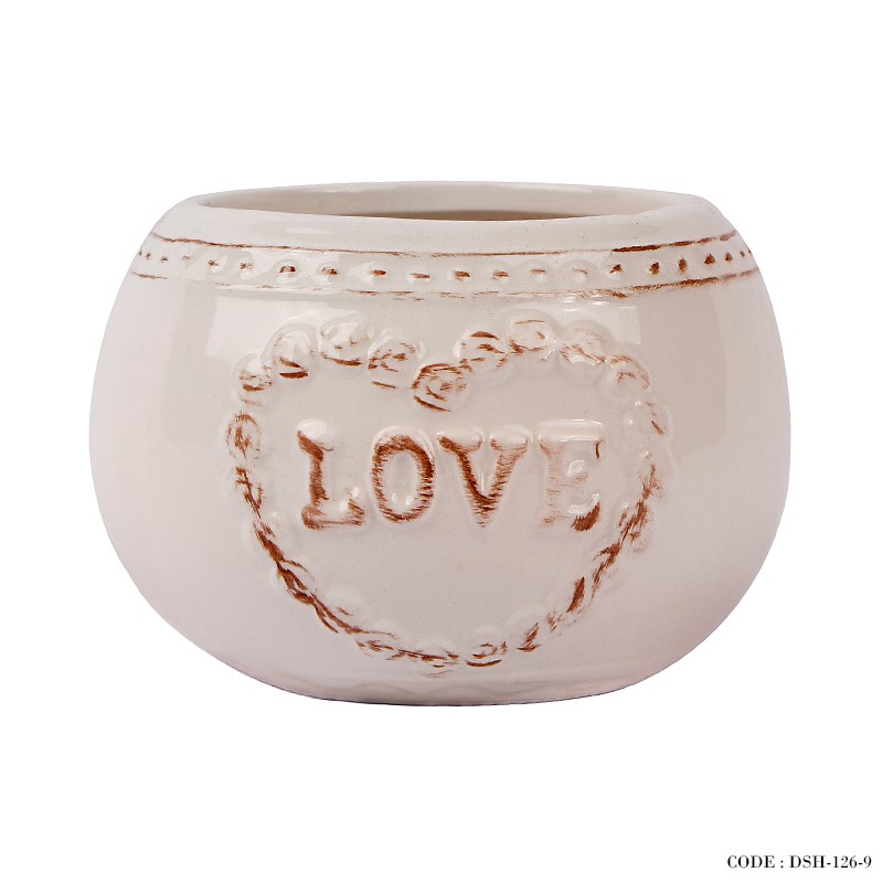 گلدان سرامیکی طرح home گرد